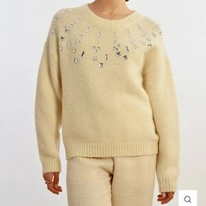 Elegant Cream Sweater with Embellishments